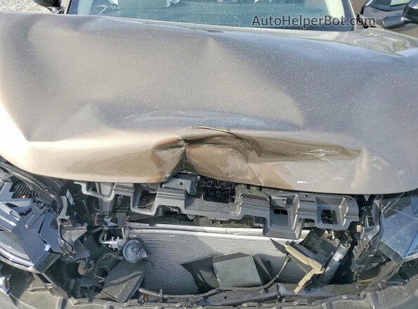 3N8AP6CE8TL304702 2026 NISSAN KICKS Brown Вид задньої частини салону