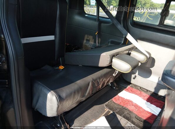 3N8CM0JT4GK702064 2016 NISSAN NV200 TAXI Black VIN კოდის სტიკერის ხედი