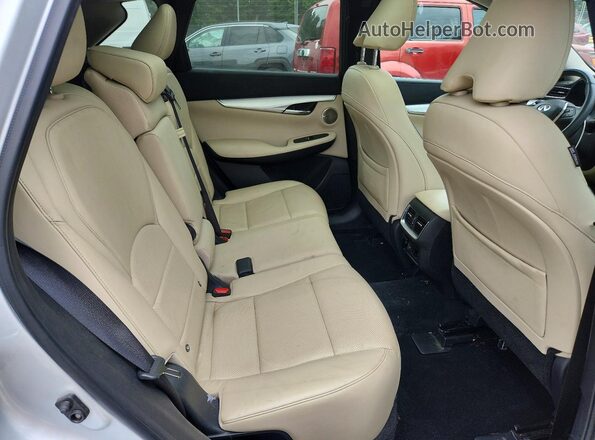 3PCAJ5M30KF104740 2019 INFINITI QX50 Silver Rear interior view