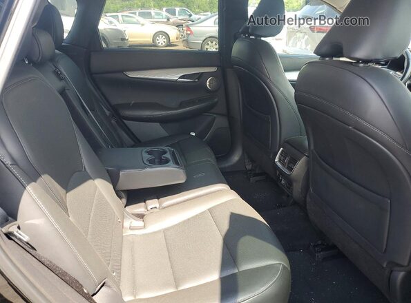 3PCAJ5M32KF144463 2019 INFINITI QX50 Black Rear interior view