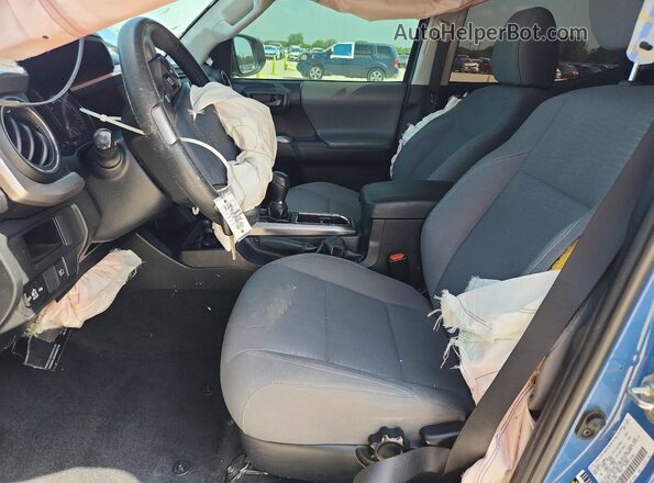 3TMAZ5CN2KM112006 2019 TOYOTA TACOMA Blue Вид салону спереду