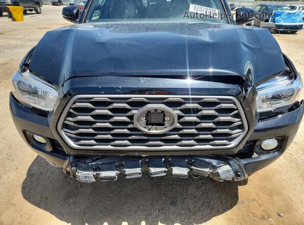 3TMAZ5CN2MM146143 2021 TOYOTA TACOMA Black Widok wnętrza z tyłu