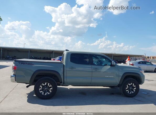 3TMAZ5CN2PM213988 2023 TOYOTA TACOMA Green Widok wnętrza z tyłu