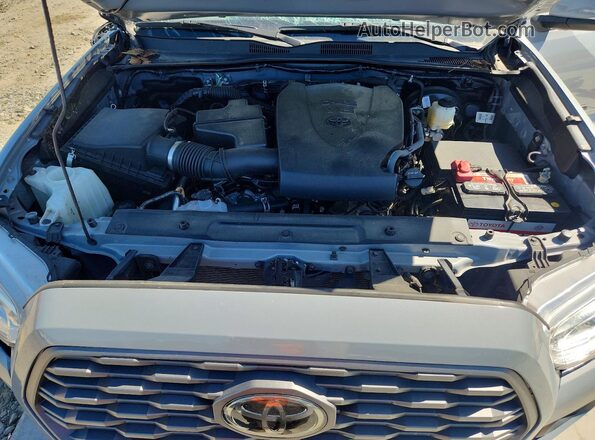 3TMAZ5CN5MM147044 2021 TOYOTA TACOMA Gray Вид задньої частини салону