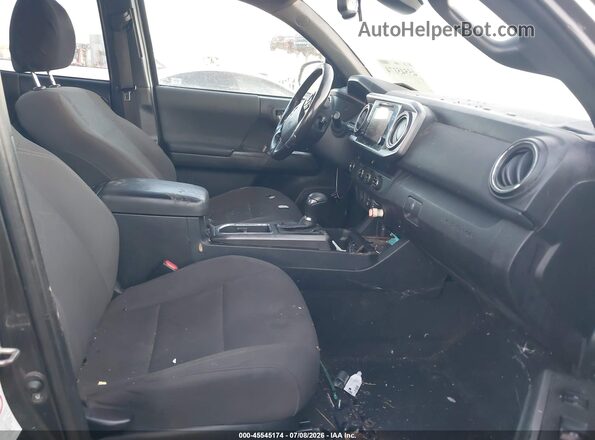 3TMAZ5CN8JM055065 2018 TOYOTA TACOMA Gray Vista interior delantera