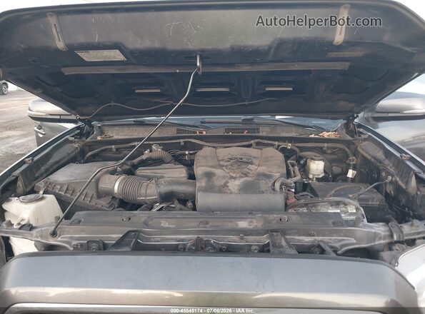 3TMAZ5CN8JM055065 2018 TOYOTA TACOMA Gray Vista trasera
