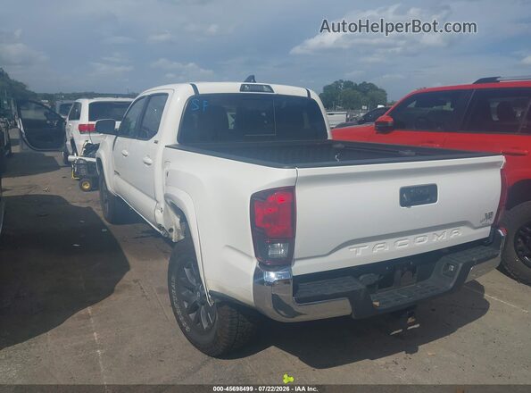 3TMAZ5CN9MM148116 2021 TOYOTA TACOMA White Trasero izquierdo