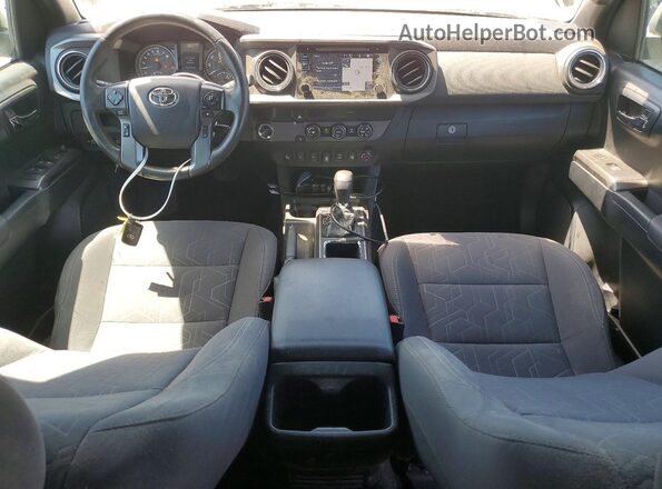 3TMAZ5CNXKM096878 2019 TOYOTA TACOMA White Առջևի վահանակի տեսք