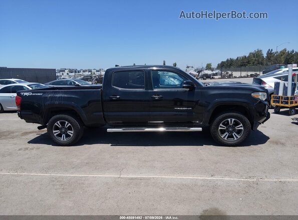 3TMBZ5DN1HM005945 2017 TOYOTA TACOMA Черный Вид задней части салона