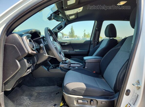 3TMBZ5DN3PM040257 2023 TOYOTA TACOMA White Widok wnętrza z przodu