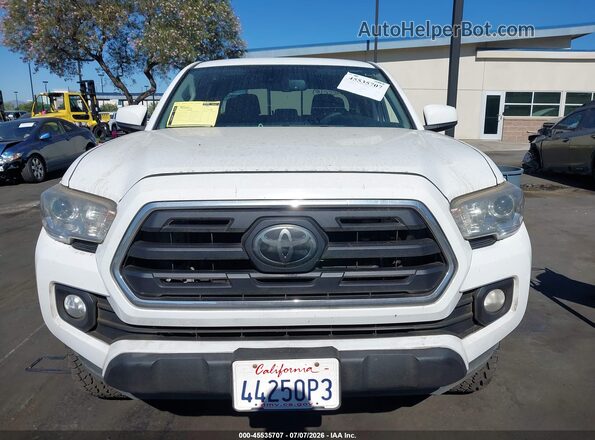3TMBZ5DN5JM014752 2018 TOYOTA TACOMA Белый Вид задней части салона