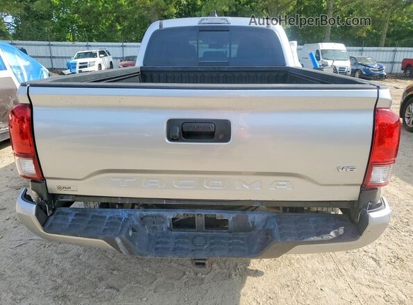 3TMBZ5DN6PM038938 2023 TOYOTA TACOMA Silver Вид ззаду
