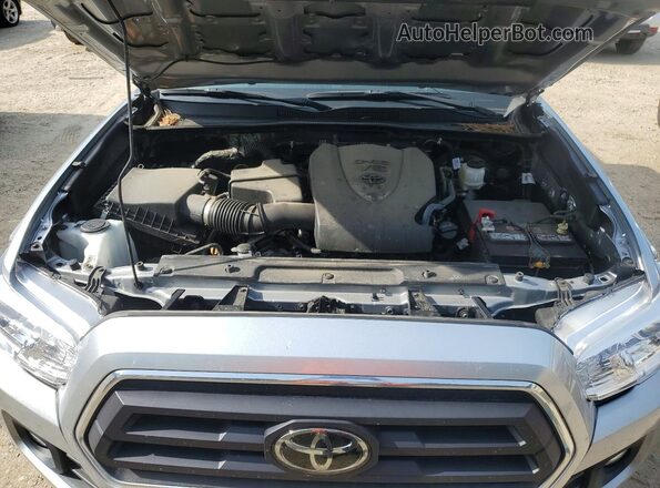 3TMBZ5DN6PM038938 2023 TOYOTA TACOMA Silver Вид задньої частини салону