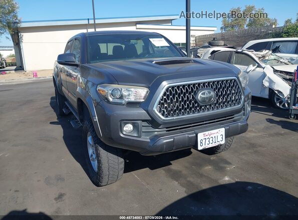 3TMBZ5DN7JM014719 2018 TOYOTA TACOMA Gray Rear interior view