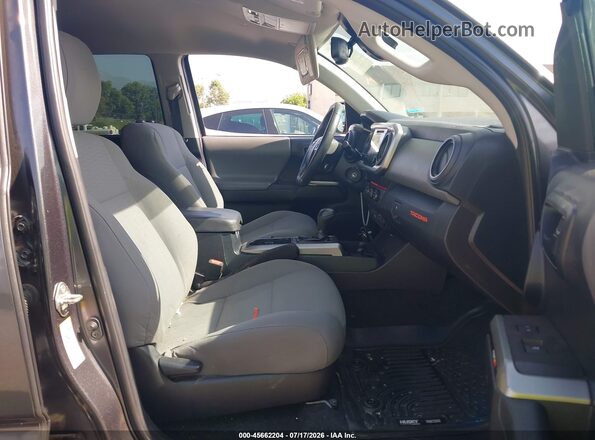 3TMBZ5DN9KM018952 2019 TOYOTA TACOMA Gray Вид салону спереду