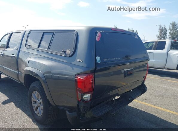 3TMBZ5DN9KM018952 2019 TOYOTA TACOMA Gray Вид спереду