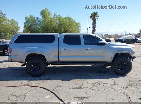 3TMBZ5DN9LM025613 2020 TOYOTA TACOMA Silver Սալոնի հետևի տեսք