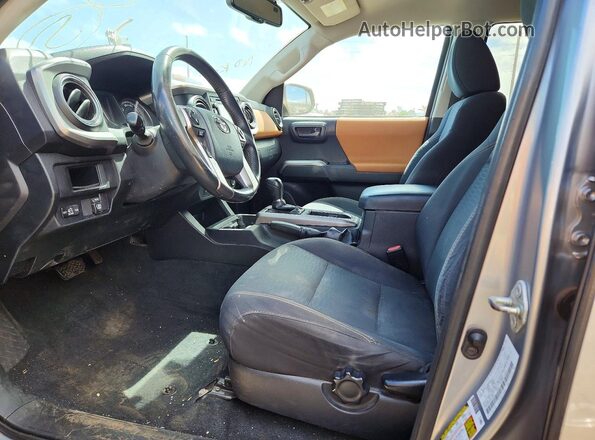 3TMBZ5DNXHM012067 2017 TOYOTA TACOMA Silver Front interior view