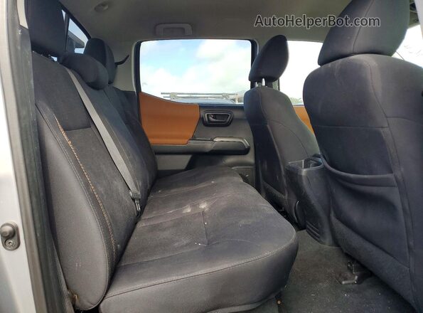 3TMBZ5DNXHM012067 2017 TOYOTA TACOMA Silver Rear seats view
