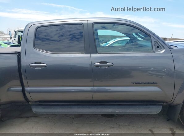 3TMBZ5DNXJM012785 2018 TOYOTA TACOMA Gray Vista interior trasera