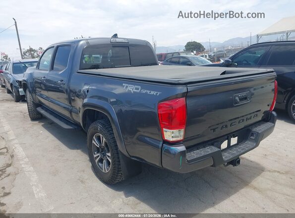 3TMBZ5DNXJM012785 2018 TOYOTA TACOMA Gray Trasero izquierdo