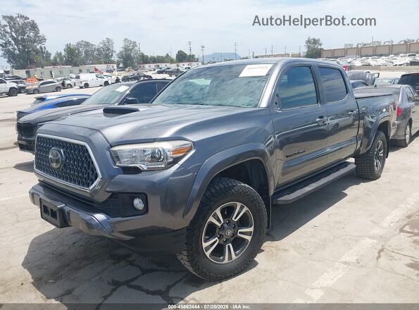 3TMBZ5DNXJM012785 2018 TOYOTA TACOMA Gray Vista tres cuartos delantera izquierda