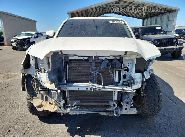 3TMCZ5AN0MM412142 2021 TOYOTA TACOMA White Դիմացի տեսք