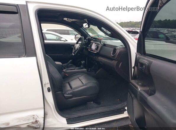 3TMCZ5AN0MM445528 2021 TOYOTA TACOMA White Սալոնի դիմացի տեսք