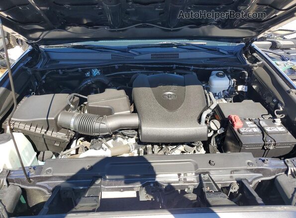 3TMCZ5AN0PM587107 2023 TOYOTA TACOMA Gray Вид задньої частини салону