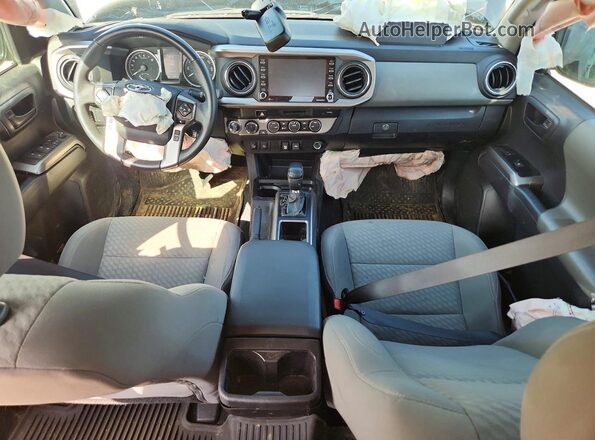 3TMCZ5AN0PM587351 2023 TOYOTA TACOMA Серый Вид панели приборов
