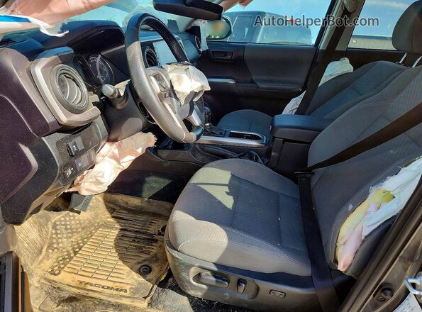 3TMCZ5AN0PM587351 2023 TOYOTA TACOMA Серый Вид салона спереди