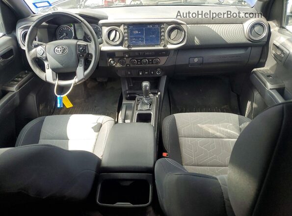 3TMCZ5AN0PM594929 2023 TOYOTA TACOMA Blue Widok deski rozdzielczej