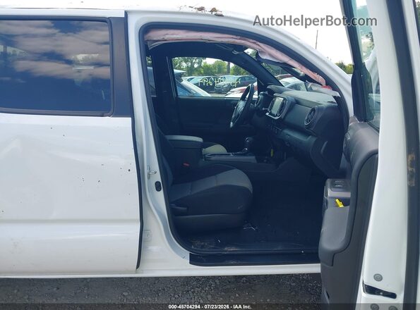 3TMCZ5AN0PM623605 2023 TOYOTA TACOMA White Widok wnętrza z przodu