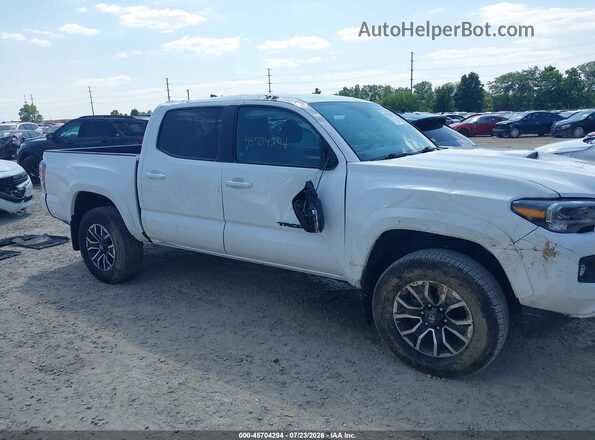 3TMCZ5AN0PM623605 2023 TOYOTA TACOMA White Widok wnętrza z tyłu