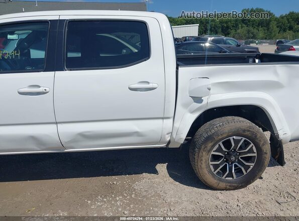 3TMCZ5AN0PM623605 2023 TOYOTA TACOMA White Widok z przodu