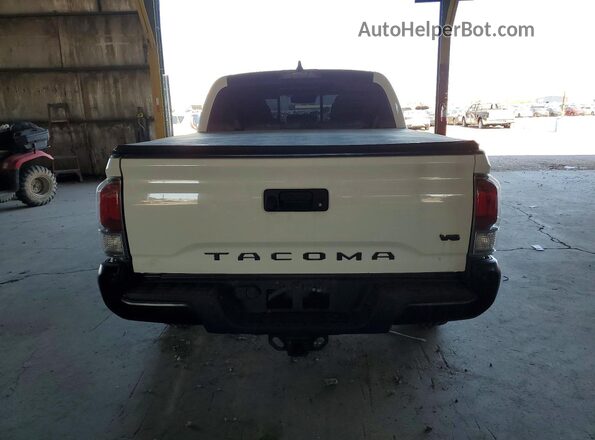 3TMCZ5AN0PM644762 2023 TOYOTA TACOMA White Widok z tyłu