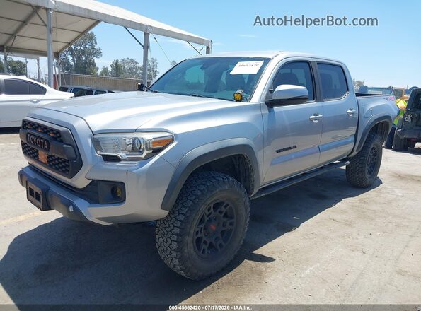 3TMCZ5AN1KM223867 2019 TOYOTA TACOMA Silver Առջևի ձախ երեք քառորդ տեսարան