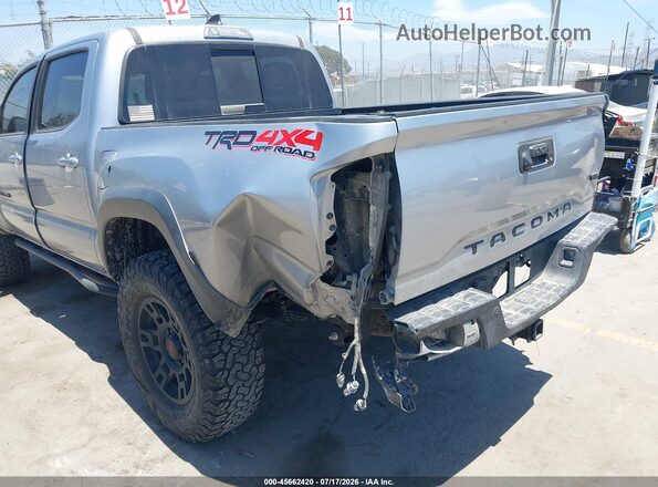 3TMCZ5AN1KM223867 2019 TOYOTA TACOMA Silver Դիմացի տեսք