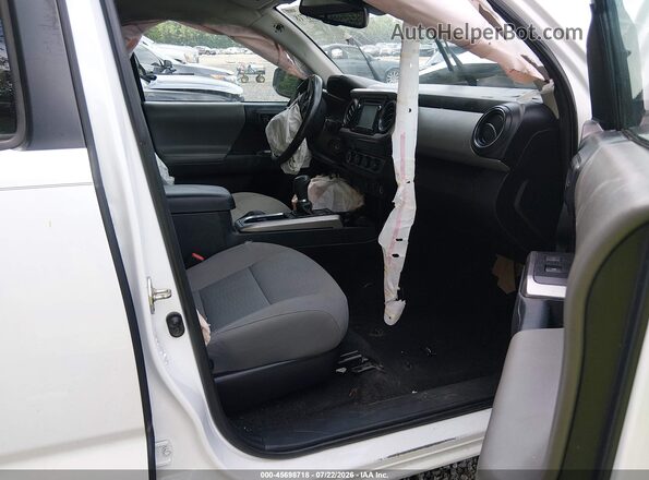 3TMCZ5AN1KM247036 2019 TOYOTA TACOMA Белый Вид салона спереди