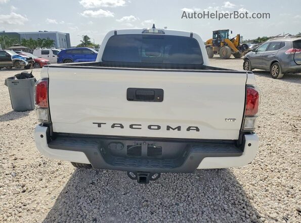3TMCZ5AN1PM621748 2023 TOYOTA TACOMA White Vista trasera