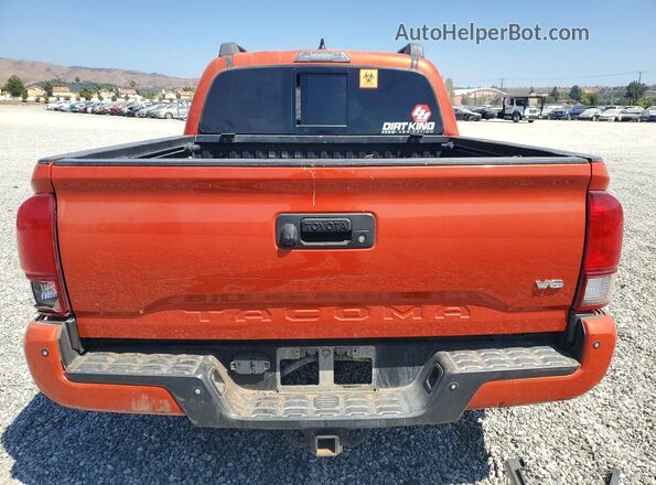 3TMCZ5AN2JM181630 2018 TOYOTA TACOMA Orange Widok z tyłu
