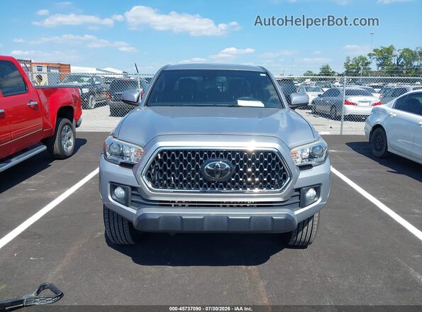 3TMCZ5AN2KM206768 2019 TOYOTA TACOMA Silver Rear interior view