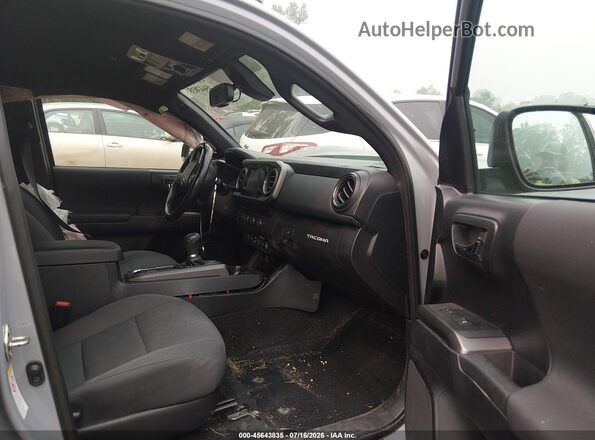 3TMCZ5AN2KM218032 2019 TOYOTA TACOMA Gray Vista interior delantera