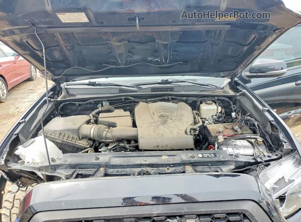 3TMCZ5AN2KM226616 2019 TOYOTA TACOMA Black Widok wnętrza z tyłu