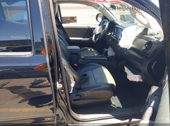 3TMCZ5AN2MM397241 2021 TOYOTA TACOMA Black Front interior view