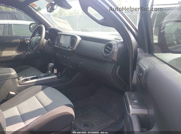3TMCZ5AN2PM596665 2023 TOYOTA TACOMA Gray წინა სალონის ხედი
