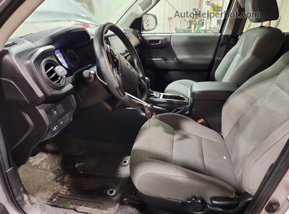 3TMCZ5AN2PM613786 2023 TOYOTA TACOMA Silver Front interior view