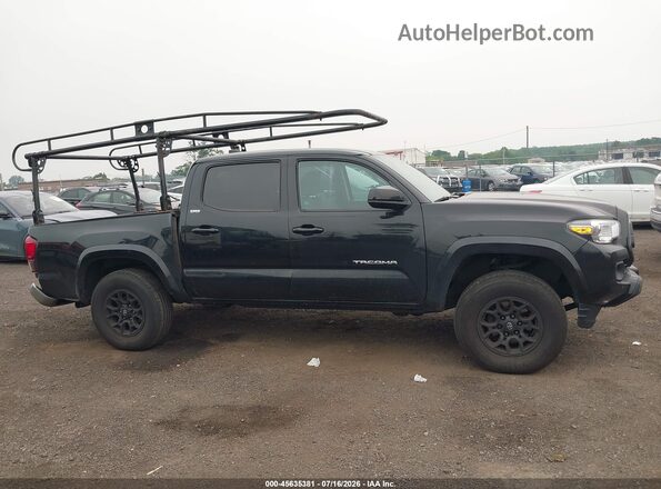 3TMCZ5AN3NM460459 2022 TOYOTA TACOMA Black Rear interior view