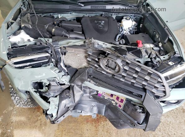 3TMCZ5AN3PM614140 2023 TOYOTA TACOMA Gray Սալոնի հետևի տեսք