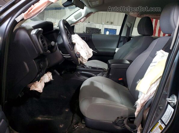 3TMCZ5AN3PM621766 2023 TOYOTA TACOMA Серый Вид салона спереди